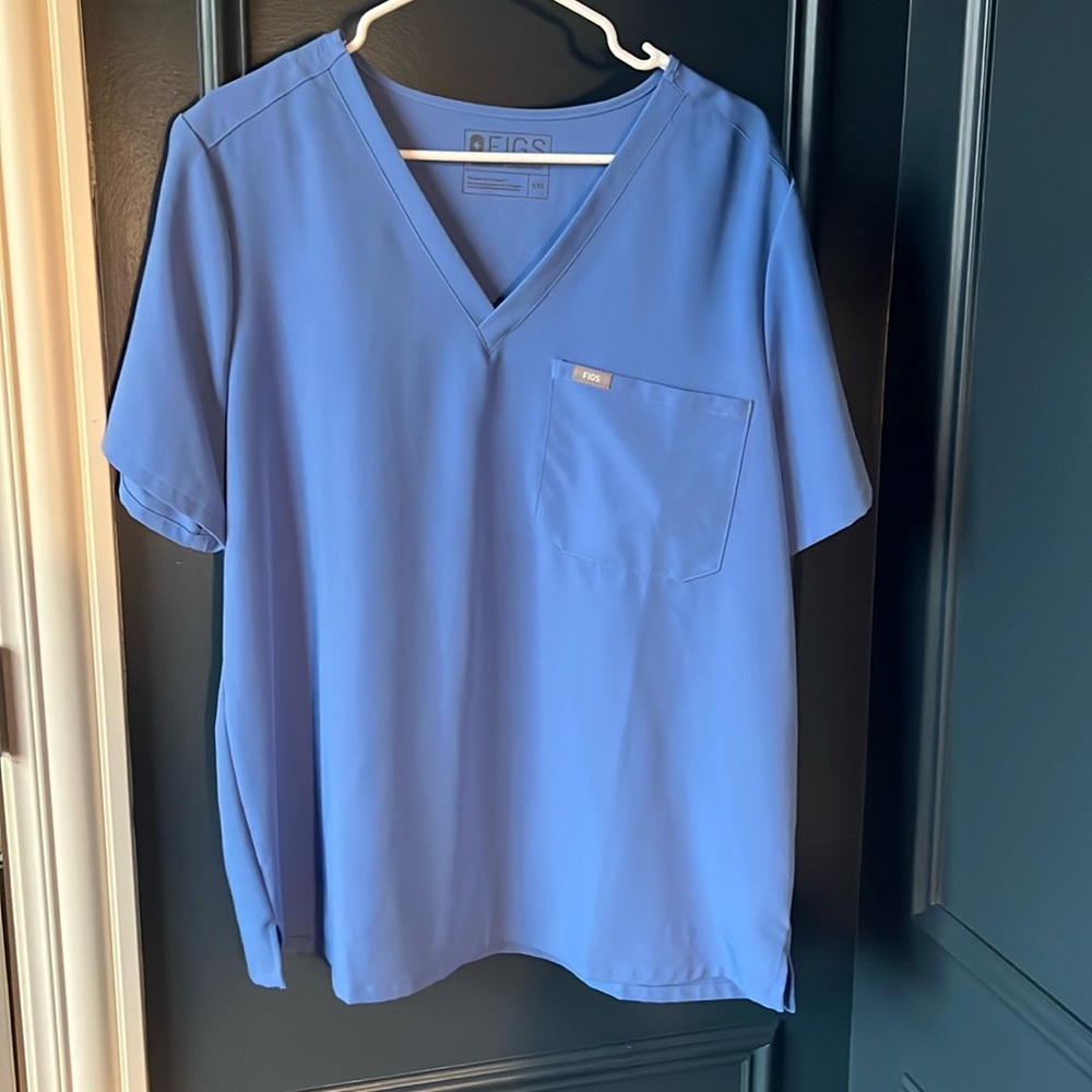Never worn. One pocket scrub top